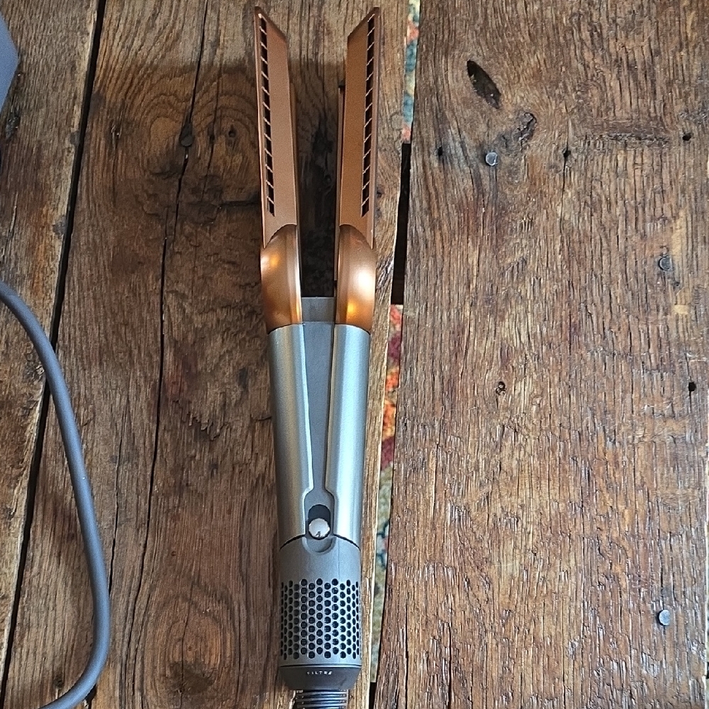 Elegant Bronze and Silver Hair Styling Tool